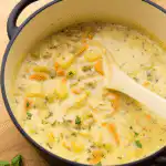 Leftover Turkey Soup in a bowl with carrots, turkey, and potatoes