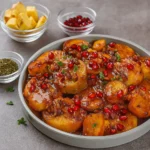 Bobby Flay Sweet Potato Recipe with glaze, pecans, and pomegranate