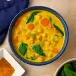 Curried Chickpea Soup served with cilantro and lemon