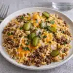 Cheeseburger Orzo Delight served in a bowl with parsley on top