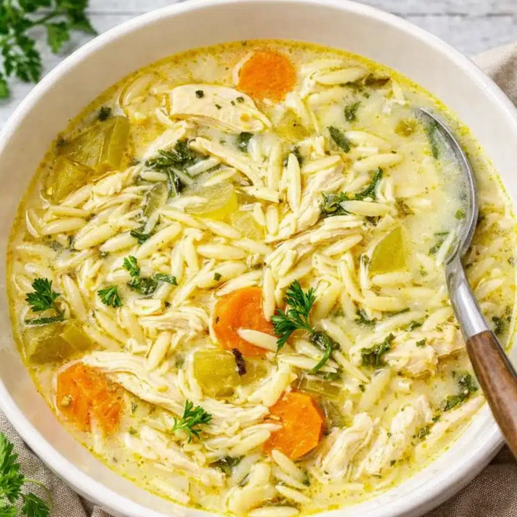 Creamy Lemon Chicken Orzo Soup in rustic bowl