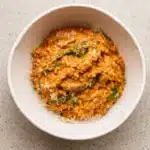 Ground Beef Orzo with Tomato Cream Sauce in a white bowl