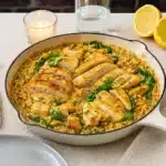 Lemon Garlic Chicken Orzo with Spinach in a skillet
