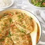 Baked Boursin Chicken with Spinach and Tomatoes in skillet