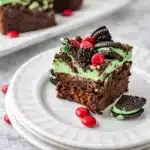 Best Grinch Brownies with green frosting and red candies