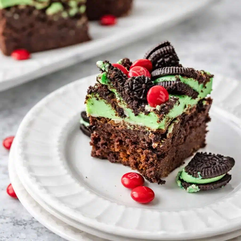 Best Grinch Brownies with green frosting and red candies