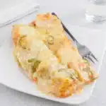 Shrimp Enchiladas Recipe with Creamy Sauce and Melted Cheese