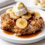 Bananas Foster Cobbler served warm with vanilla ice cream