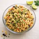 Mexican Macaroni Salad in a large bowl with corn and black beans