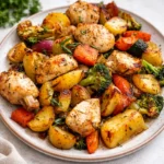 Sheet Pan Lemon Herb Chicken and Vegetables on a baking tray